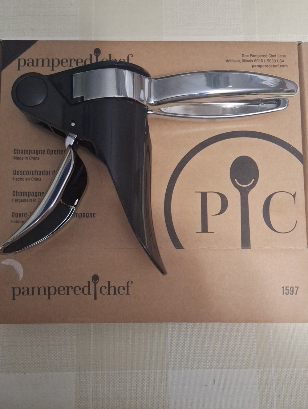 Champagne opener on box